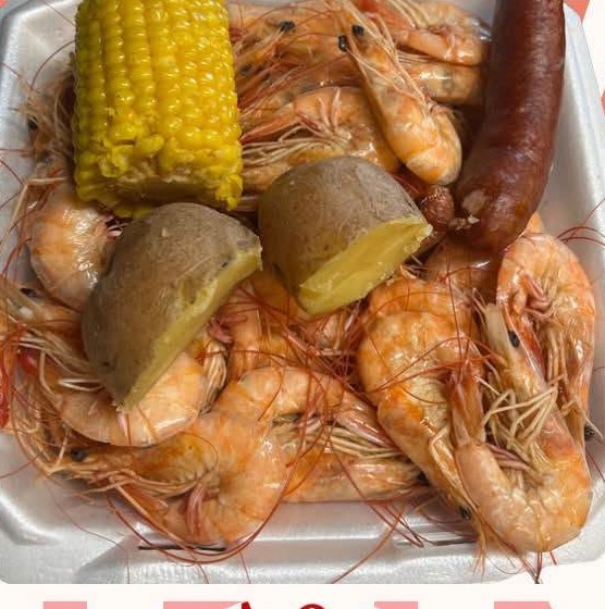 SO90 DAQS & SACKS: a boiled shrimp tray with corn, potato and sausage